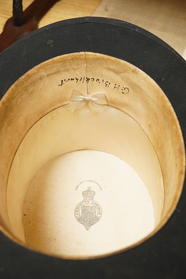 A cased Christys’ London black silk top hat, head-hole 20x16cm